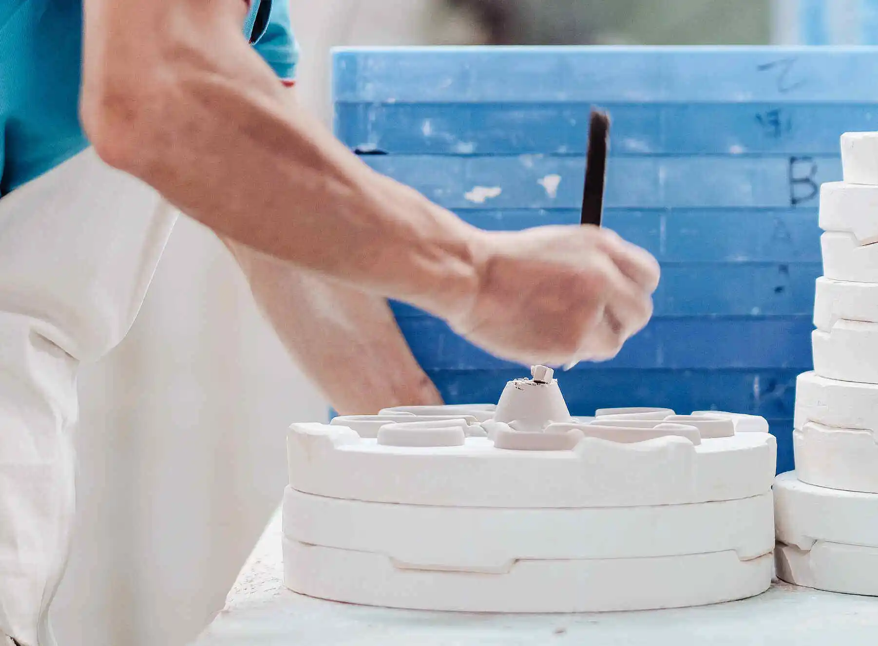 craftsmen-handling-mold the making of